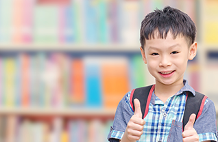 Student giving thumb up